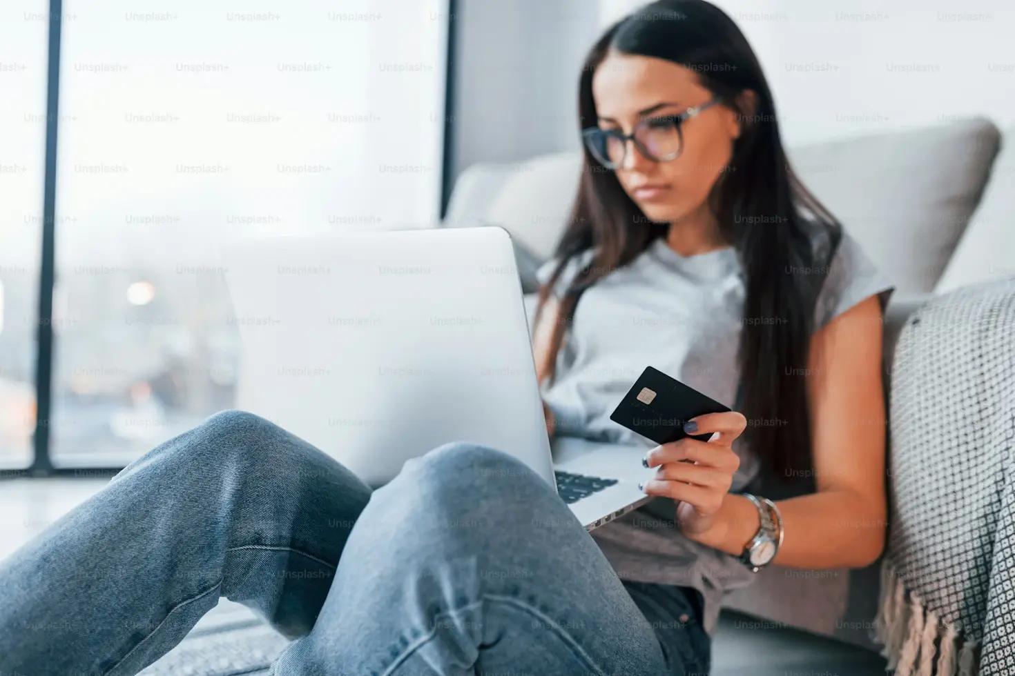 Woman with laptop and credit card